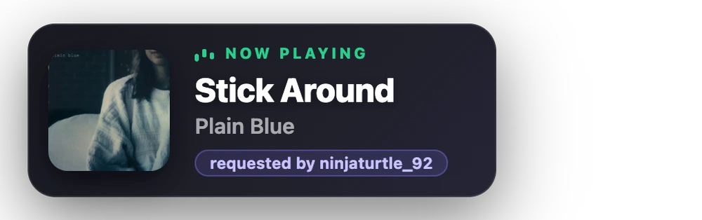 SongSeek animated OBS now-playing overlay card showing album art, the song title Stick Around by Plain Blue, and a requested-by badge